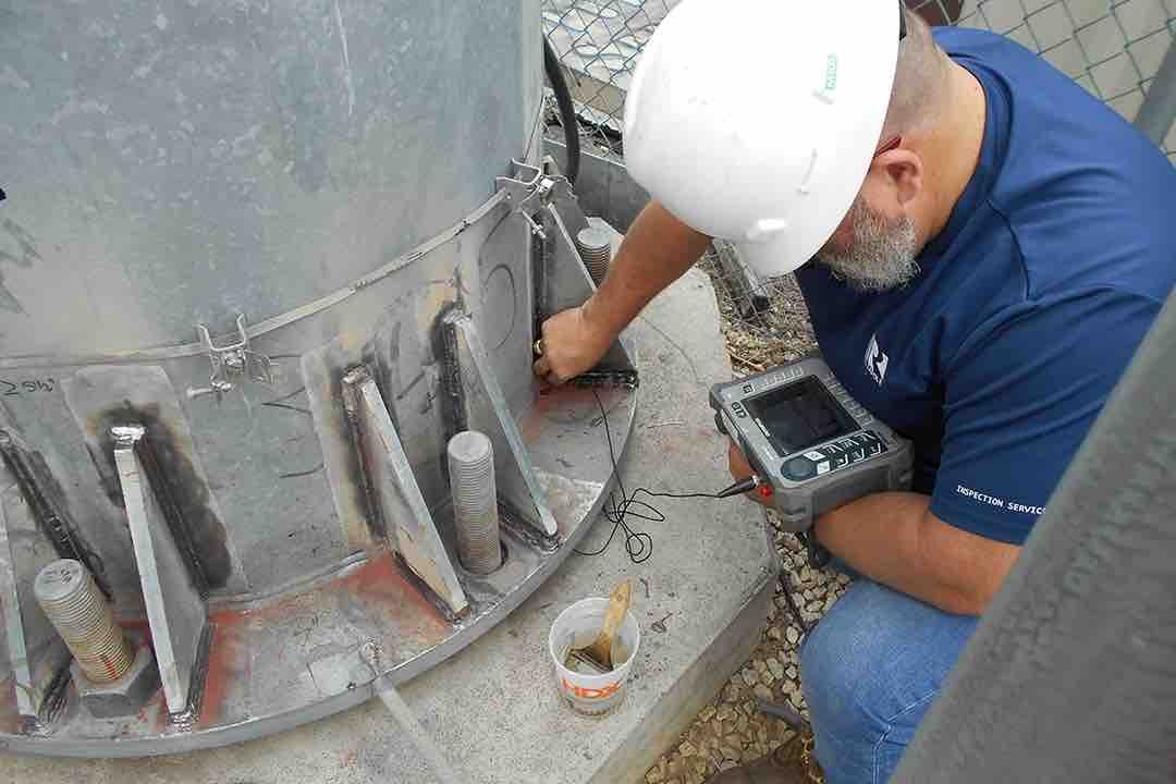 Man working on electrical pole